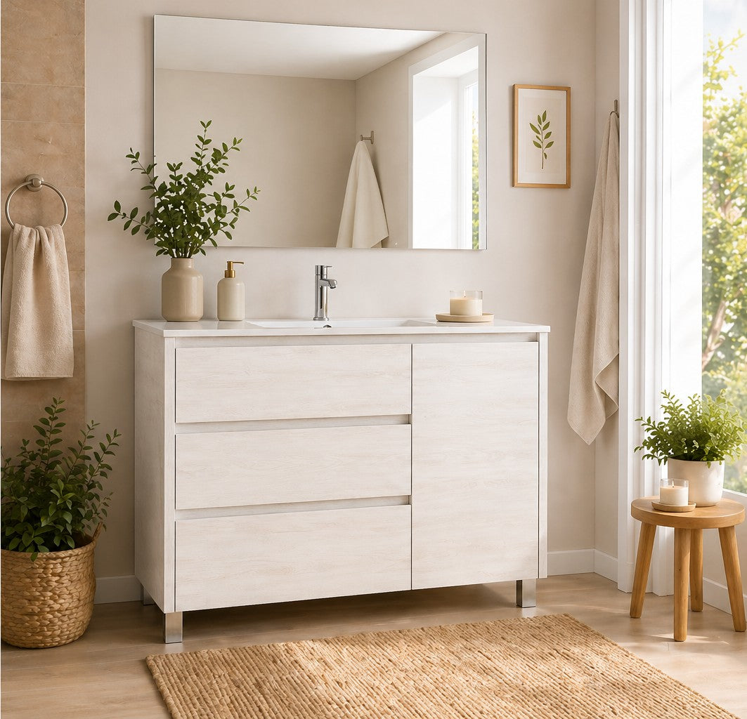 Meuble de salle de bain avec VOLUM comprenant 3 tiroirs, une porte et un lavabo